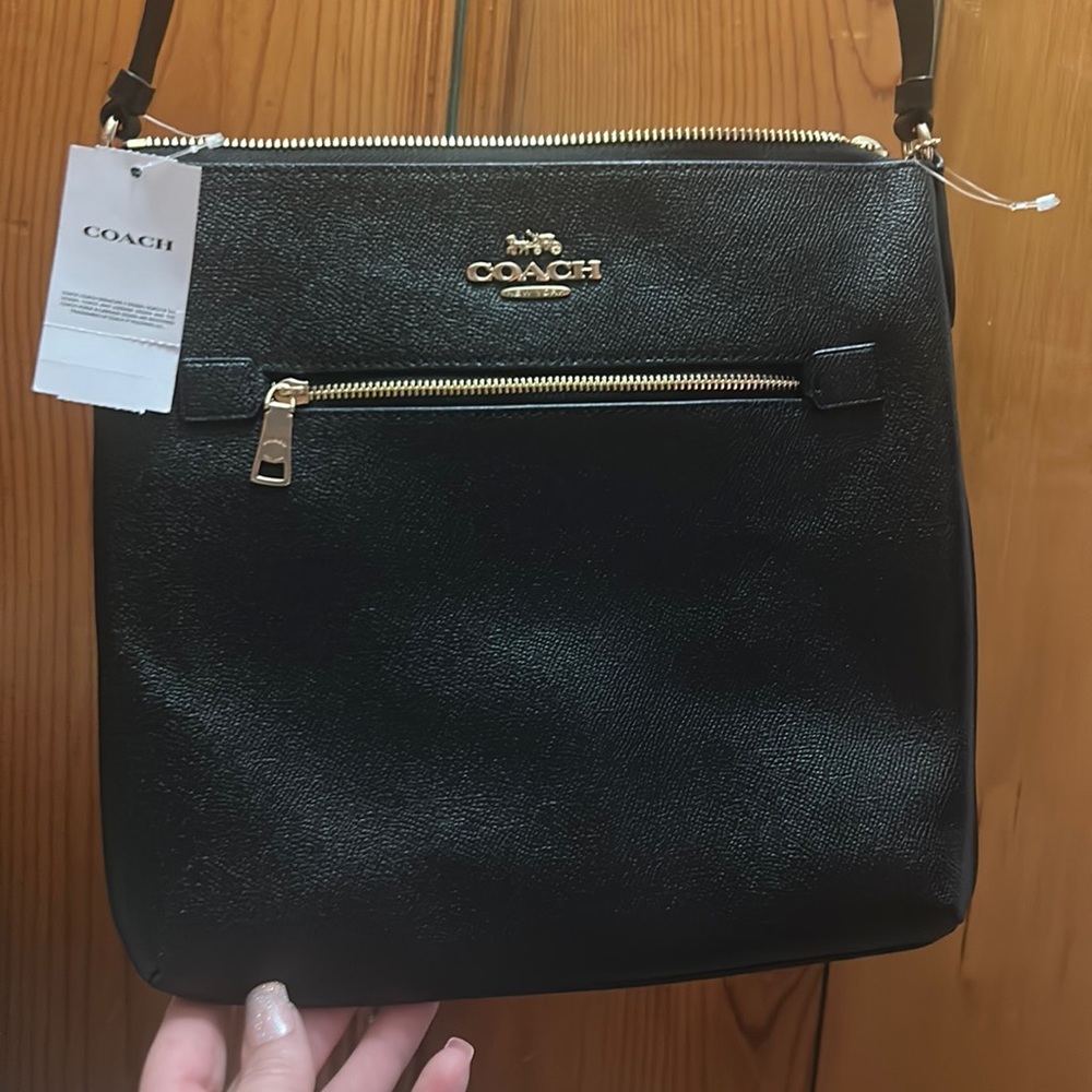 Never used black Coach Leather Rowan File Bag